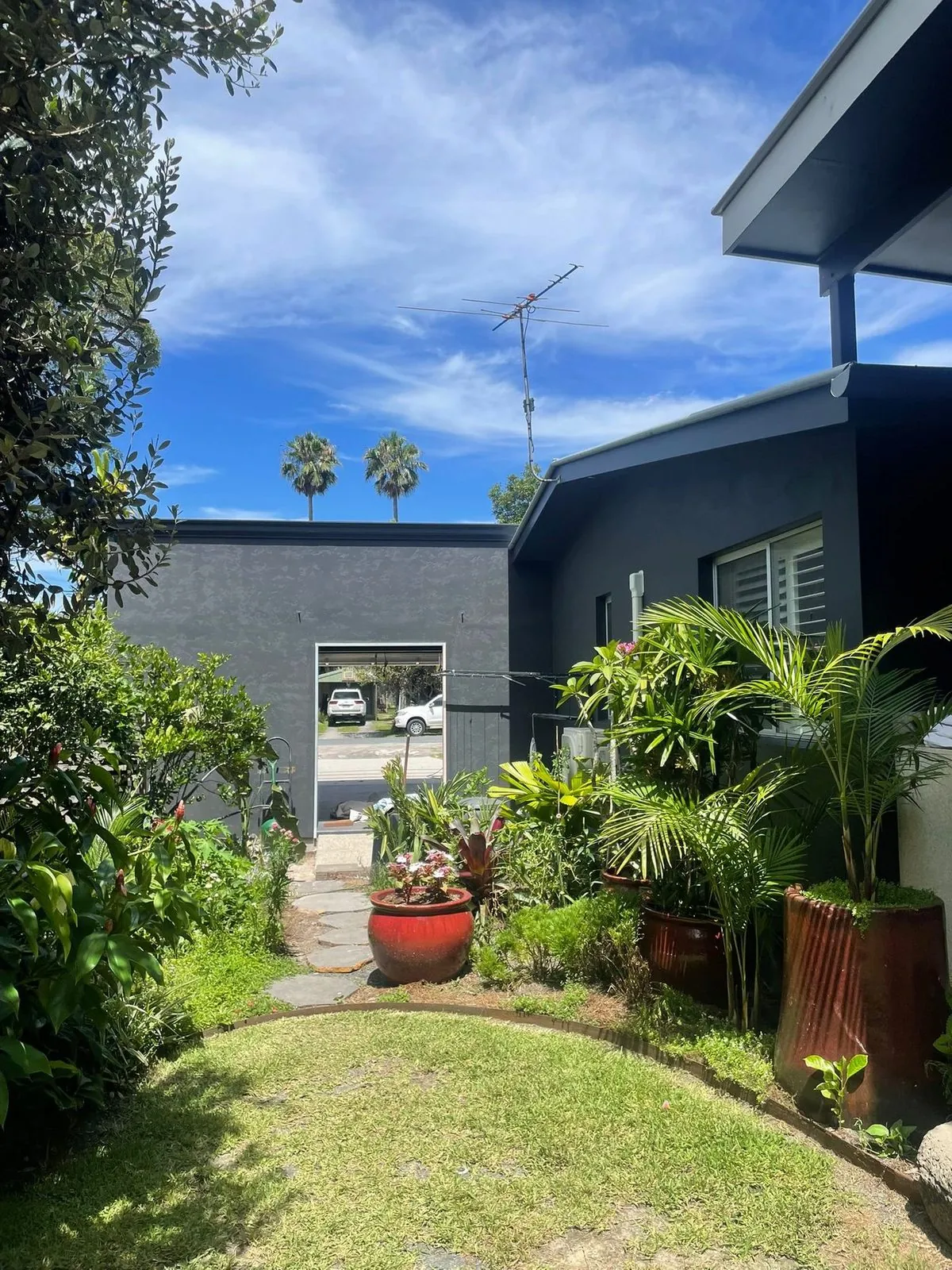 Modern charcoal exterior repaint at Casuarina